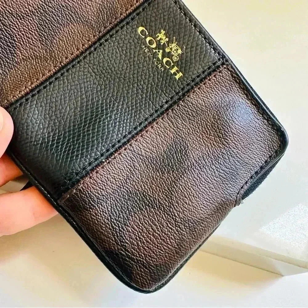 Coach Corner Zip Wristlet In Signature Leather